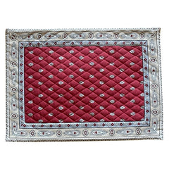 Reversible quilted cotton placemat in Bastide Red Grey by Marat d’Avignon, featuring a deep red floral diamond motif with ornate grey paisley borders on the front, and a delicate red-and-white floral pattern on the reverse, crafted in Provence.
