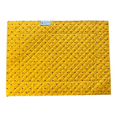 Reversible quilted cotton placemat in Fleurette Yellow Red by Marat d’Avignon, featuring a red diamond-quilted center with petite golden florals and yellow floral scroll borders on the front, and an allover red reverse with red floral accents, crafted in Provence.