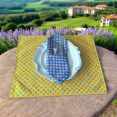 Provence cotton napkins featuring a blue background with light brown floral designs from the Le Cluny Olives Mimosa French Country Collection, made of 100% cotton, measuring 18" x 18", with vibrant, fade-resistant prints.