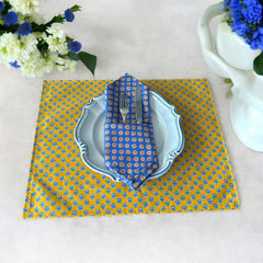 Provence cotton napkins featuring a blue background with light brown floral designs from the Le Cluny Olives Mimosa French Country Collection, made of 100% cotton, measuring 18" x 18", with vibrant, fade-resistant prints.