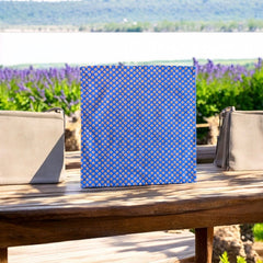 Provence cotton napkins featuring a blue background with light brown floral designs from the Le Cluny Olives Mimosa French Country Collection, made of 100% cotton, measuring 18" x 18", with vibrant, fade-resistant prints.