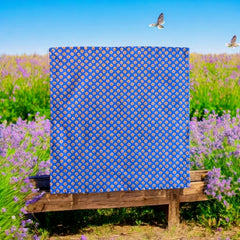 Provence cotton napkins featuring a blue background with light brown floral designs from the Le Cluny Olives Mimosa French Country Collection, made of 100% cotton, measuring 18" x 18", with vibrant, fade-resistant prints.