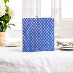 Provence cotton napkins featuring a blue background with light brown floral designs from the Le Cluny Olives Mimosa French Country Collection, made of 100% cotton, measuring 18" x 18", with vibrant, fade-resistant prints.