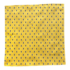 Provence cotton napkins featuring a yellow background with blue and yellow floral designs, part of the Avignon Collection from Marat d’Avignon made of 100% cotton, measuring 18" x 18", with vibrant, fade-resistant prints. Made in France.