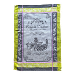French Provence tea towel featuring the Rosé de Provence Appellation Contrôlée design, showcasing a vineyard and winery in elegant cotton. Available in orange with yellow accents and green with soft purple and gray details. Decorative and eco-friendly kitchen decor.