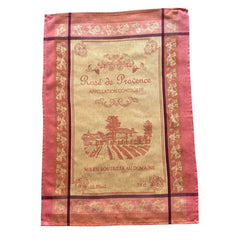 French Provence tea towel featuring the Rosé de Provence Appellation Contrôlée design, showcasing a vineyard and winery in elegant cotton. Available in orange with yellow accents and green with soft purple and gray details. Decorative and eco-friendly kitchen decor.