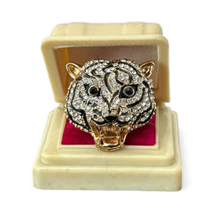 Gold-tone adjustable cocktail ring shaped like a tiger’s head, featuring clear rhinestones and black enamel detailing; ornate design with sparkling facial features and bold statement style, sourced in France and in very good condition.