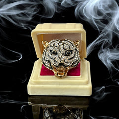 Gold-tone adjustable cocktail ring shaped like a tiger’s head, featuring clear rhinestones and black enamel detailing; ornate design with sparkling facial features and bold statement style, sourced in France and in very good condition.
