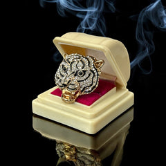 Gold-tone adjustable cocktail ring shaped like a tiger’s head, featuring clear rhinestones and black enamel detailing; ornate design with sparkling facial features and bold statement style, sourced in France and in very good condition.