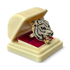 Gold-tone adjustable cocktail ring shaped like a tiger’s head, featuring clear rhinestones and black enamel detailing; ornate design with sparkling facial features and bold statement style, sourced in France and in very good condition.