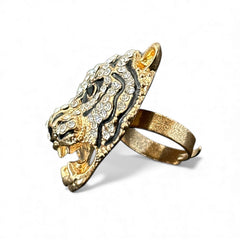 Gold-tone adjustable cocktail ring shaped like a tiger’s head, featuring clear rhinestones and black enamel detailing; ornate design with sparkling facial features and bold statement style, sourced in France and in very good condition.