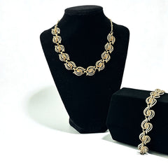 Vintage 1950s white enamel and gold-tone necklace and bracelet set with openwork textured wire design, adjustable hook clasp necklace and snap lock bracelet, in very good condition with light enamel wear.