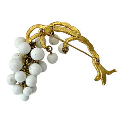 Vintage milk glass brooch featuring three single beads and a grape cluster hanging from textured gold-tone branches, possibly unsigned Marvella from the 1970s/80s, in very good condition with a whimsical and elegant design.