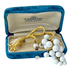 Vintage milk glass brooch featuring three single beads and a grape cluster hanging from textured gold-tone branches, possibly unsigned Marvella from the 1970s/80s, in very good condition with a whimsical and elegant design.