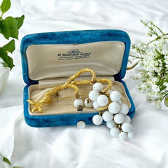 Vintage milk glass brooch featuring three single beads and a grape cluster hanging from textured gold-tone branches, possibly unsigned Marvella from the 1970s/80s, in very good condition with a whimsical and elegant design.