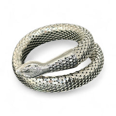 Vintage Whiting & Davis silver-tone mesh snake wrap bracelet with sculpted serpent head and tail, coiled design, adjustable fit, and detailed scale texture—symbolic of transformation and eternity.