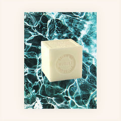Mini Marseille soap with Lily of the Valley scent, crafted in France using traditional craftsmanship, 3.5 oz natural and biodegradable soap bar for sensitive skin.