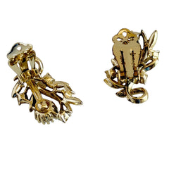 Vintage light gold‑tone floral clip‑on earrings with AB topaz rhinestones in a mid‑century design.