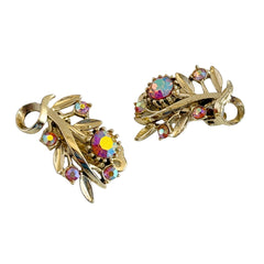 Vintage light gold‑tone floral clip‑on earrings with AB topaz rhinestones in a mid‑century design.