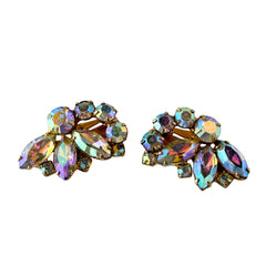Vintage gold‑tone floral clip‑on earrings with iridescent AB marquise and round rhinestones reflecting rainbow hues.