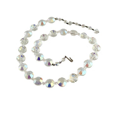 Vintage AB crystal coin necklace with large faceted iridescent beads, clear spacers, and an adjustable hook clasp, shown on a display stand and in close‑up views.