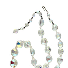 Vintage AB crystal coin necklace with large faceted iridescent beads, clear spacers, and an adjustable hook clasp, shown on a display stand and in close‑up views.