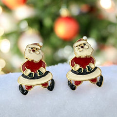 Vintage AIM Santa earrings with red, white, and black enamel, signed with copyright mark, featuring movable head and pierced stud design.