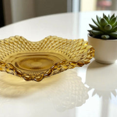Vintage amber glass dish with scalloped edge and diamond pattern, Federal Indiana style, mid-century candy or trinket bowl.