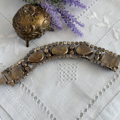 Vintage 1950s bracelet with lavender satin glass cabochons and amethyst rhinestones in prong‑set silver‑tone settings.