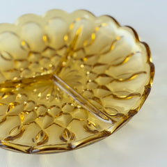 Vintage Anchor Hocking amber yellow Fairfield 3‑part relish dish with scalloped edge and geometric pressed‑glass pattern.