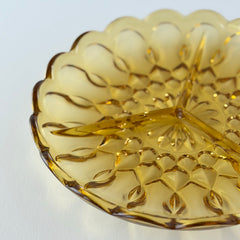 Vintage Anchor Hocking amber yellow Fairfield 3‑part relish dish with scalloped edge and geometric pressed‑glass pattern.