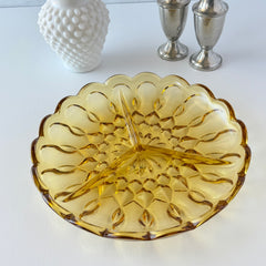 Vintage Anchor Hocking amber yellow Fairfield 3‑part relish dish with scalloped edge and geometric pressed‑glass pattern.