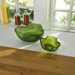 Vintage 1970s Anchor Hocking chip and dip bowl set in avocado green glass. Features sculptural wavy design and glossy finish. Includes large and small bowls in very good condition, ideal for serving or display.