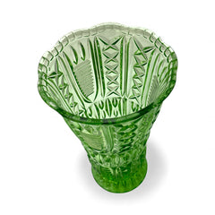 Vintage spring green pressed glass vase with scalloped rim and embossed geometric patterns, shown from various angles to highlight texture and translucence.