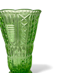 Vintage spring green pressed glass vase with scalloped rim and embossed geometric patterns, shown from various angles to highlight texture and translucence.