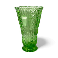 Vintage spring green pressed glass vase with scalloped rim and embossed geometric patterns, shown from various angles to highlight texture and translucence.