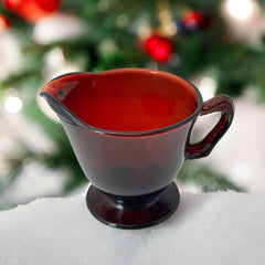 Vintage Anchor Hocking Royal Ruby Red glass creamer and cups set of 3, deep red translucent glass with glossy finish, shown in various angles to highlight design and condition.