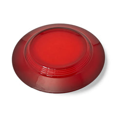 Vintage Anchor Hocking Royal Ruby relish trays arranged in a circular pattern around a coordinating red glass plate. The translucent ruby red glass glows with depth and symmetry, showcasing the sculptural triangular shapes and rich mid-century color. Ideal for holiday styling or vintage table settings.