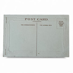 Antique 1910s embossed postcard featuring a snowy path with a person and child walking, framed by gilded orange-brown border; message reads “All Good Wishes for the New Year.