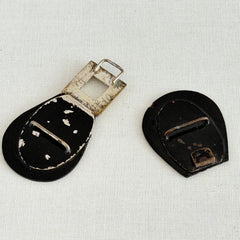Antique Czech black glass and rhinestone sash buckle with silver‑tone two‑part closure.