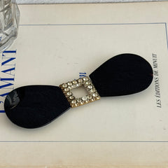 Antique Czech black glass and rhinestone sash buckle with silver‑tone two‑part closure.