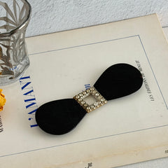 Antique Czech black glass and rhinestone sash buckle with silver‑tone two‑part closure.