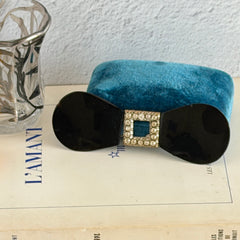 Antique Czech black glass and rhinestone sash buckle with silver‑tone two‑part closure.
