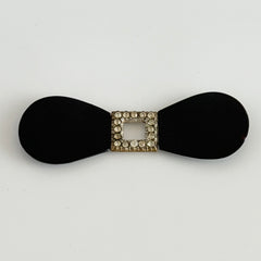 Antique Czech black glass and rhinestone sash buckle with silver‑tone two‑part closure.