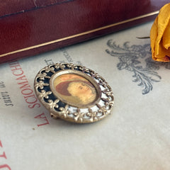 Antique Victorian portrait brooch with lithograph miniature, brass fleur‑de‑lys frame, and celluloid cover.