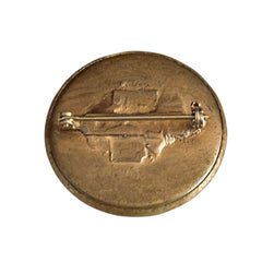 Antique Victorian portrait brooch with lithograph miniature, brass fleur‑de‑lys frame, and celluloid cover.