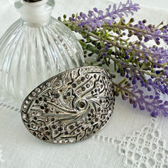 Large vintage 1920s Art Deco paste rhinestone floral shoe buckle with ornate pierced metalwork.