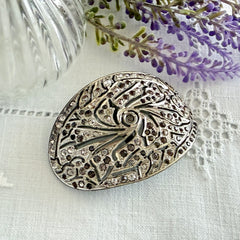 Large vintage 1920s Art Deco paste rhinestone floral shoe buckle with ornate pierced metalwork.