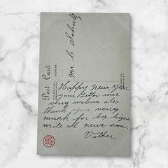 Printed vintage New Year postcard with lit candles among greenery and a poetic verse: “The door of the NEW YEAR opens… We’ll make it bright as day.” Signed F.A. Owen Co., number 506B.