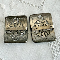 Pair of vintage 1920s paste rhinestone floral pot metal shoe buckles with original stones.